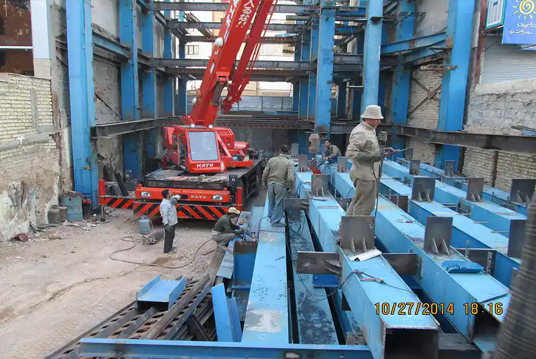 Steel beam installation and welding process – Shiraz Commercial Project